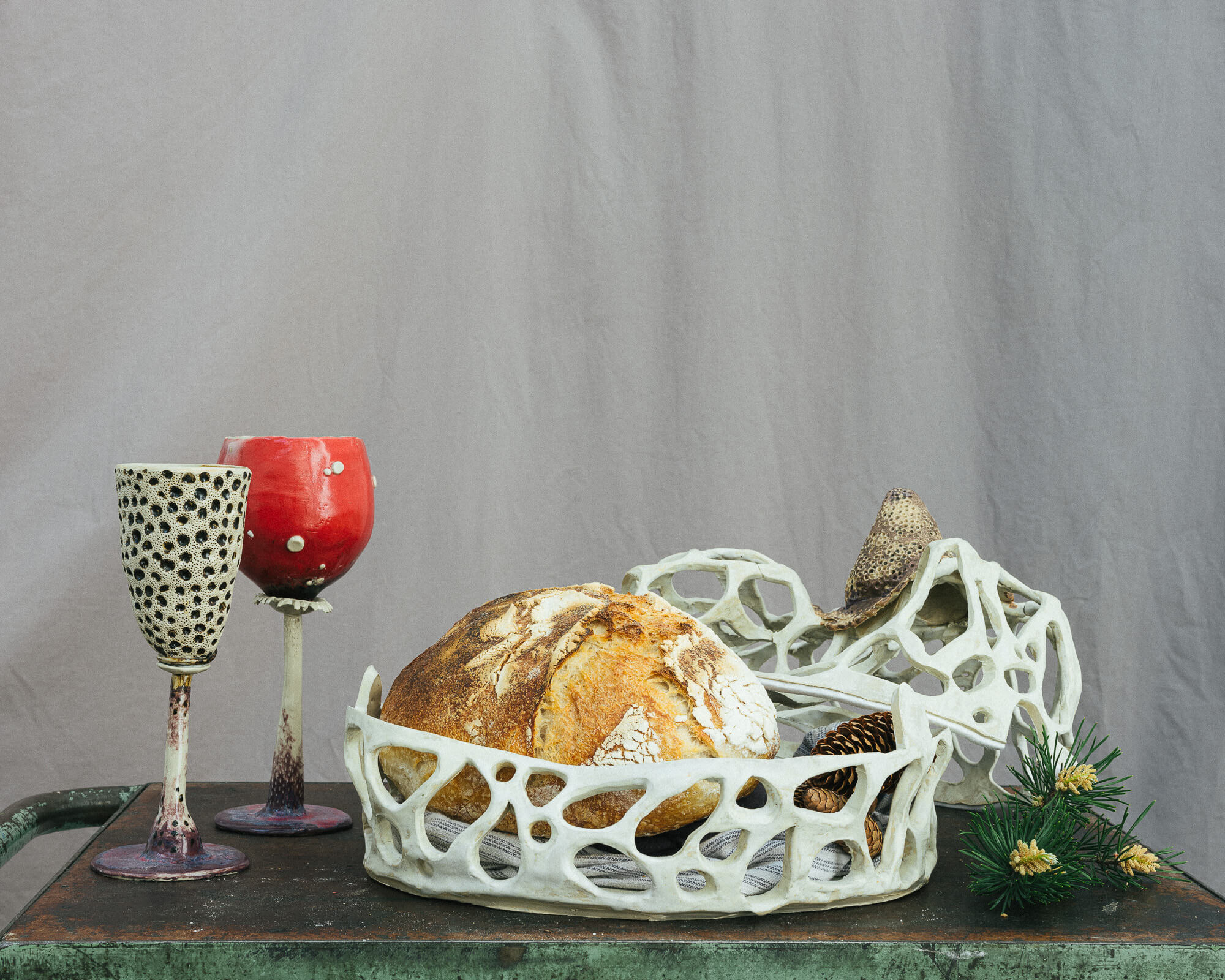 forest inspired table set, with a bowl, glass and a spoon
